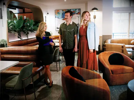 Couple talking with wedding planner