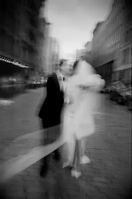 Ultra-Blurry bride and groom Kiss wedding photo