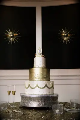 Gold and white tiered cake