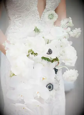 White bouquet with orchids, scabies and anemones