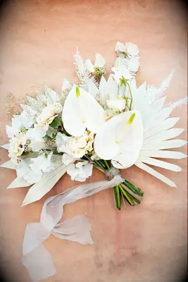 Boho bouquet with dried palm leaves and anthurium