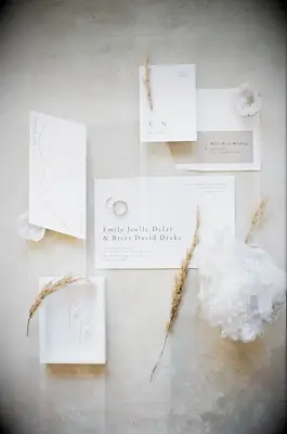 Modern and minimalist white wedding invitation suite 