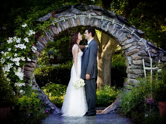 Stone arch at fairytale-themed wedding