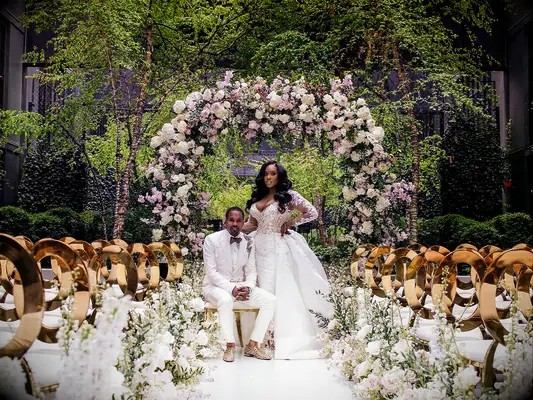 Lush floral decor at fairytale wedding ceremony