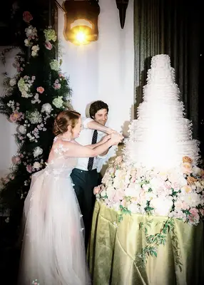 Six-tier fairytale-themed wedding cake