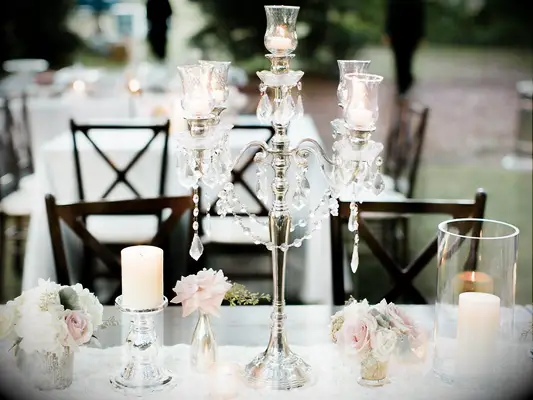 Romantic wedding candelabras at fairytale-themed wedding