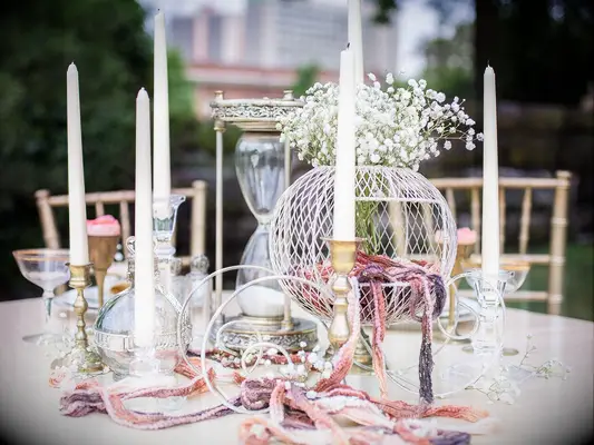 Cinderella-inspired centerpiece at fairytale-themed wedding