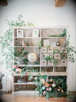 Fairytale-themed wedding gift area with greenery