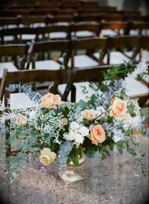 A beautiful peachy floral arrangement.