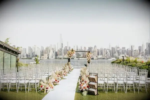 This modern wedding arch embraces both boho and urban aesthetics.