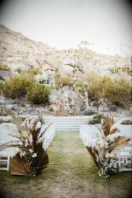 A rocky southwestern US-inspired wedding aisle.