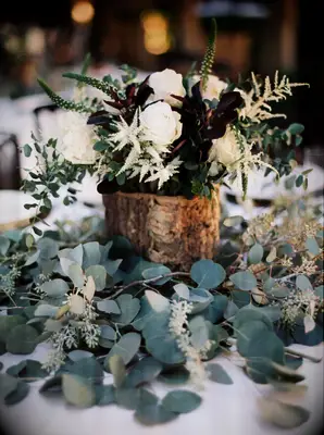 Rustic Wooden Centerpiece on Eucalyptus Leaves