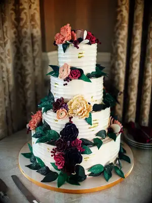 Tiered Wedding Cake with Colorful Cake Flowers
