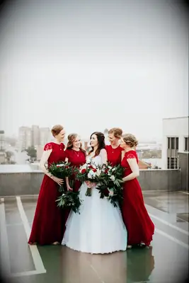 Red Bridesmaid Dresses Popped Against the Bride