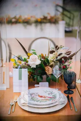 Bird-themed rustic floral wedding centerpiece