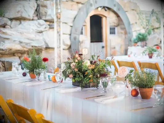 Fruit and flower pot rustic wedding centerpiece