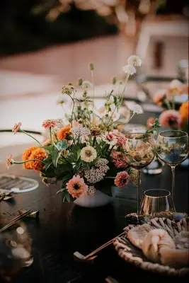 Orange zinnia floral arrangement