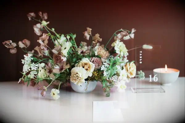 Floral arrangement with sweet pea blooms