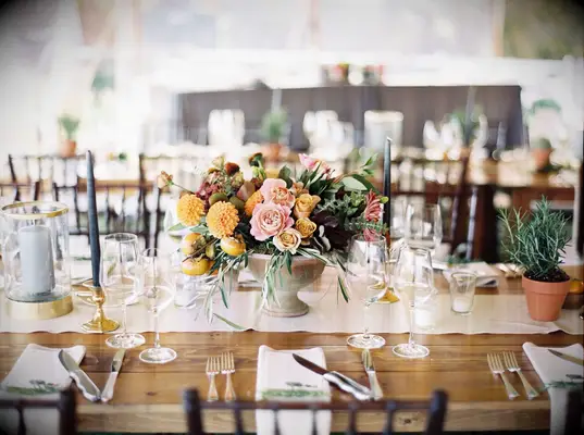 Peachy rustic floral wedding centerpiece