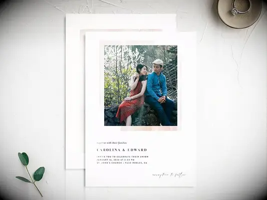 Pink border around personalized photo with event details in black minimalist type