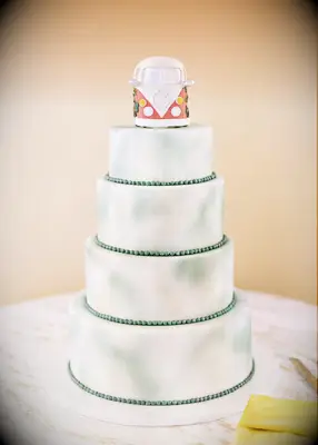 Simple 70s wedding cake with VW bus topper