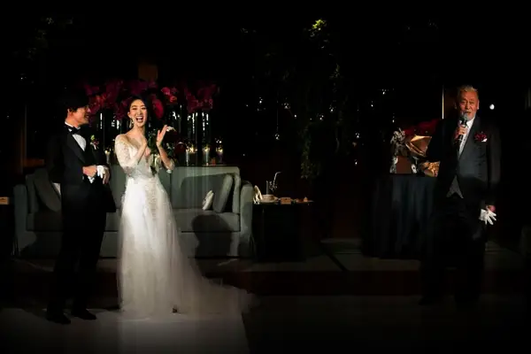 Japanese couple during toasts at wedding reception