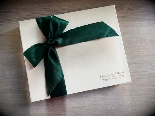 Photo album with green bow