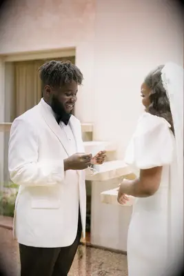 couple exchanging wedding vows provately