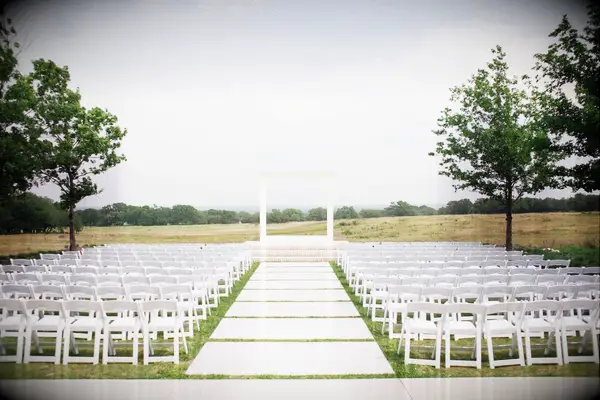 Wedding ceremony with modern white square altar arch
