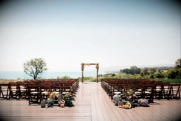 Wood ceremony arch overlooking the ocean