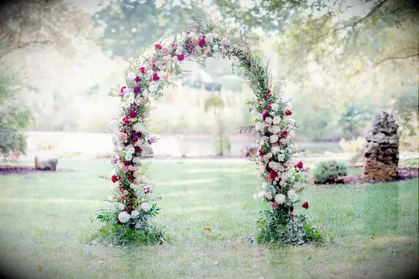 Rose-covered arch in garden