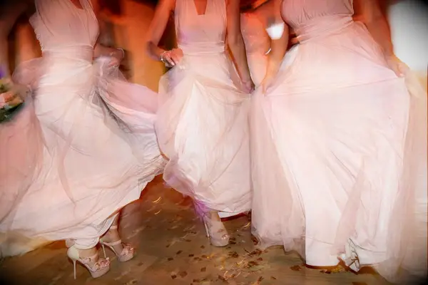 Bridesmaids dancing to upbeat wedding entrance song