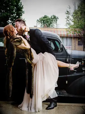 A couple kissing pose idea for wedding day photos