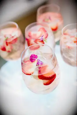 Strawberry wedding mocktails served in wine glasses