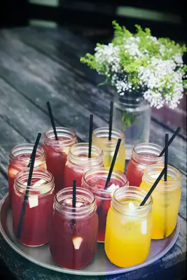 Mocktails served in mason jars at wedding 
