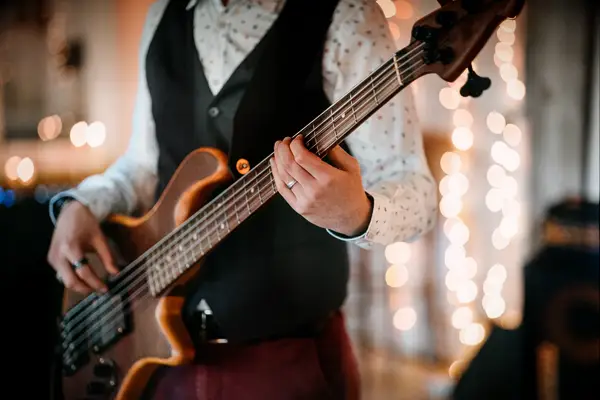 Close up of bass player