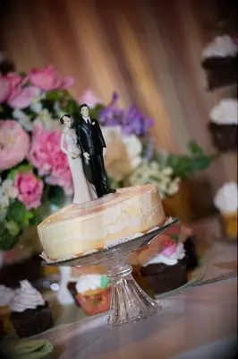 Cheesecake with wedding couple figurine