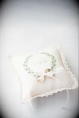 Personalized ivory ring bearer pillow with laurel wreath