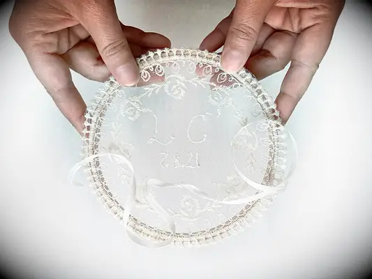 Personalized lace ring bearer pillow with initials and wedding date