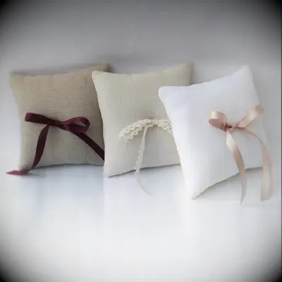 Linen ring bearer pillows with ribbon detail