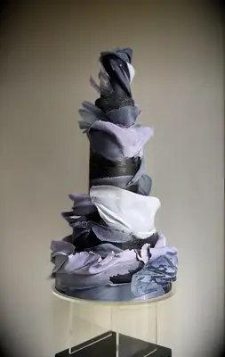 Black and purple layered wedding cake