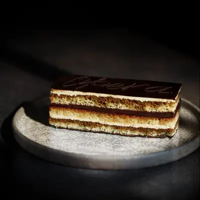 Opera cake with chocolate and coffee