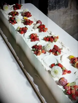 Large berry decorated rectangle cake