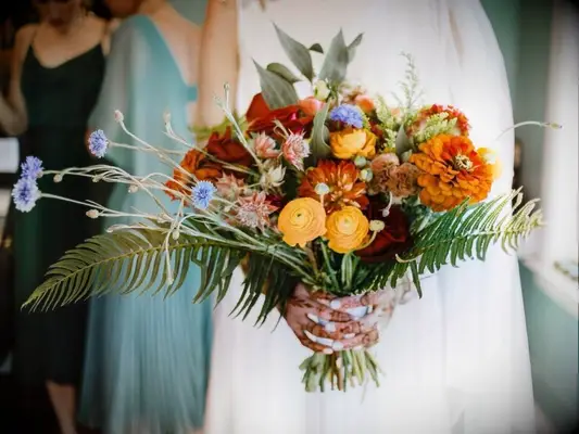 wildflower wedding bouquet with blue cornflower