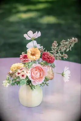 Centerpiece With Zinnias and Roses