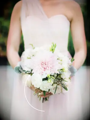 Pastel bridesmaid bouquet with dahlias and roses