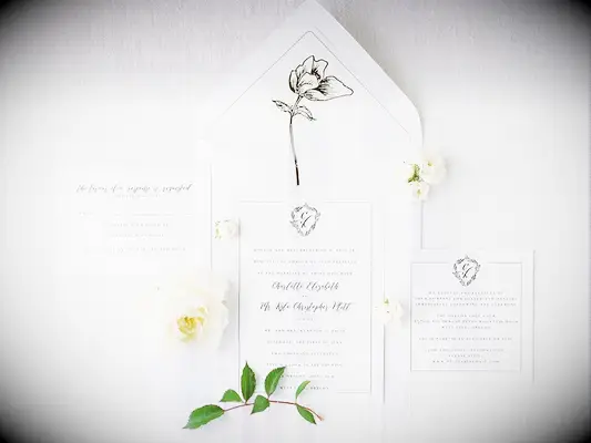 Classic white invitations garden wedding idea