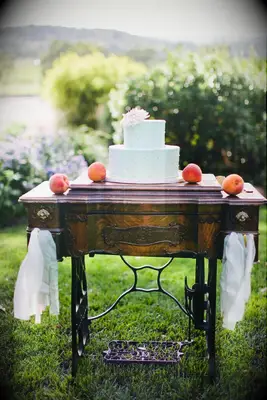 Pale blue garden wedding cake idea