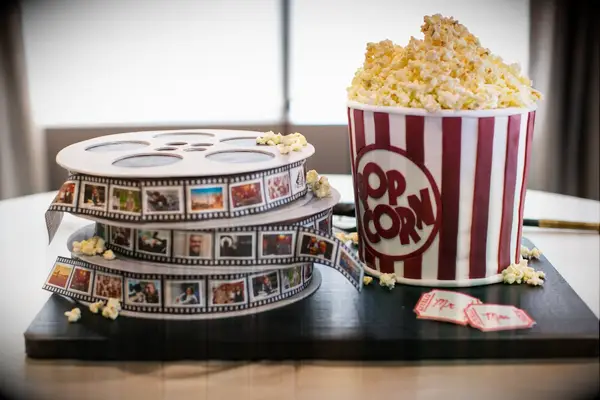 Movie reel and popcorn shaped-groom