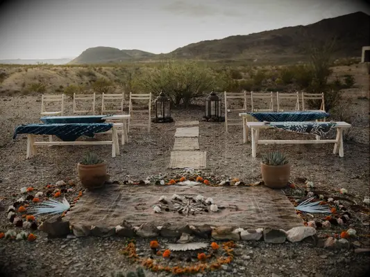 Blankets at boho wedding ceremony